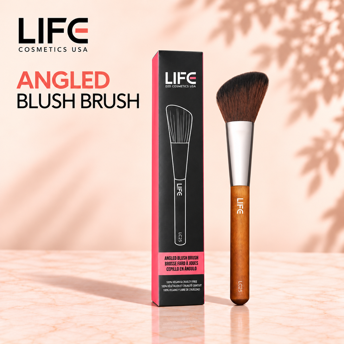 LIFE Cosmetics USA LC25 Angled Blush Brush with angled bristles and a wooden handle beside its black and pink retail box.