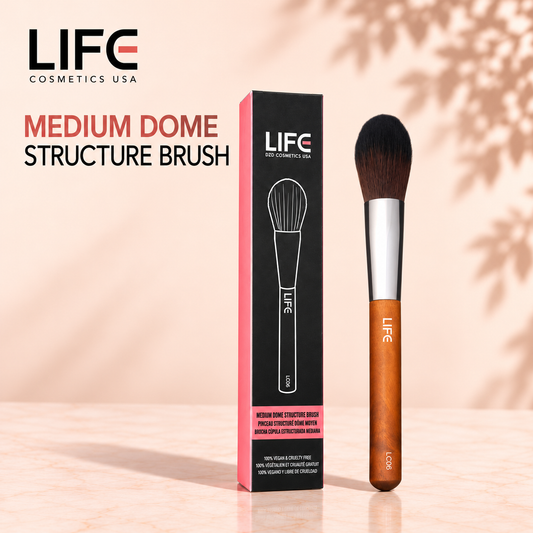 LIFE Cosmetics USA LC06 Medium Dome Structure Brush with a wooden handle beside its black and pink retail box.
