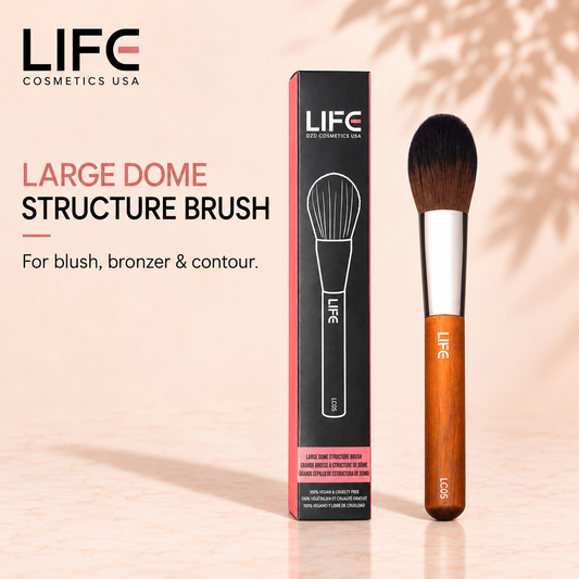 LIFE Cosmetics USA LC05 Large Dome Structure Brush with a wooden handle beside its black and pink retail box.