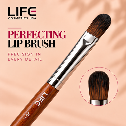 Close-up of the LIFE Cosmetics USA LC56 Perfecting Lip Brush with rounded dark bristles, a silver ferrule and wooden handle, with a circular inset highlighting the bristle shape.