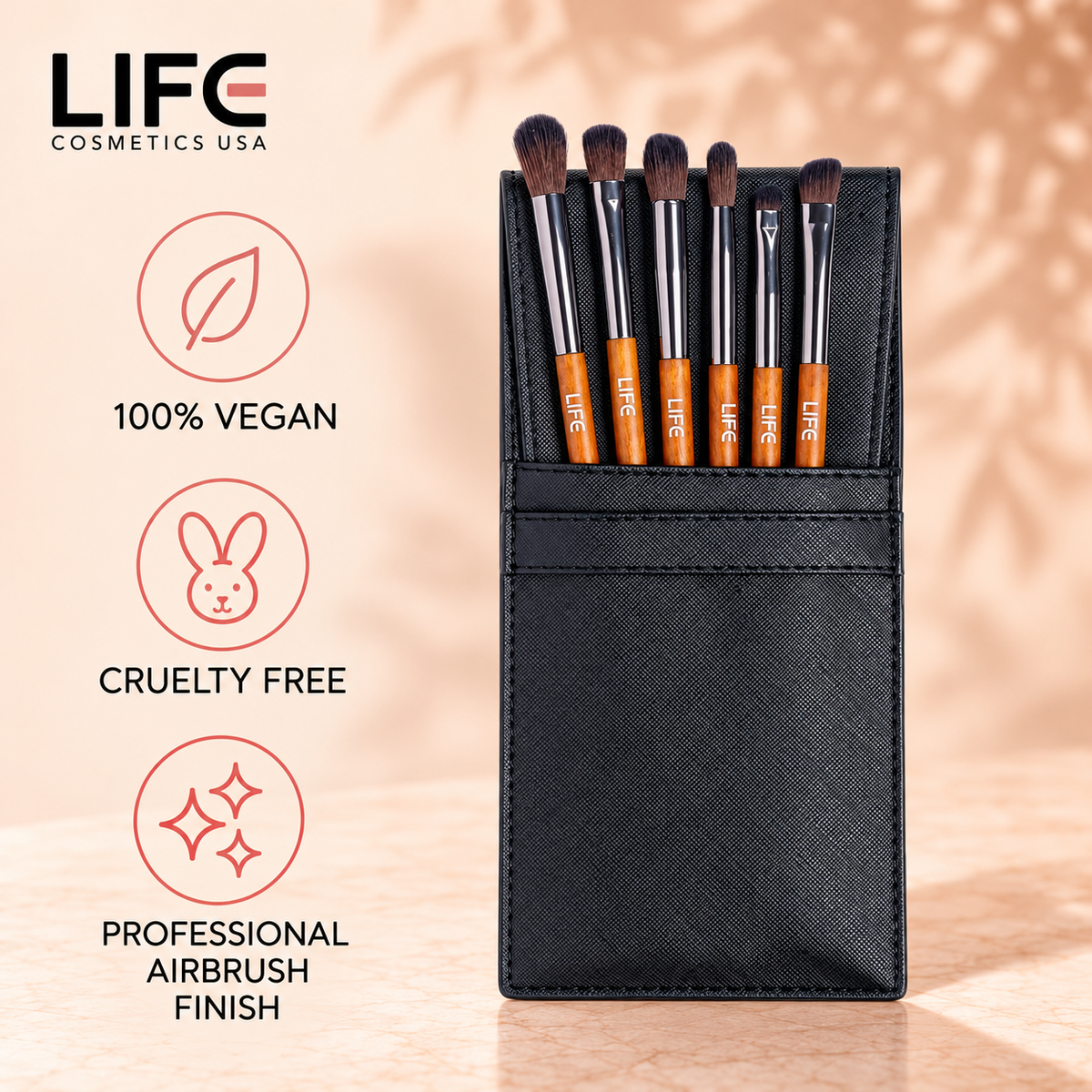 LIFE Cosmetics USA six-piece brush set in a black pouch beside icons labeled 100% vegan, cruelty free and professional airbrush finish.