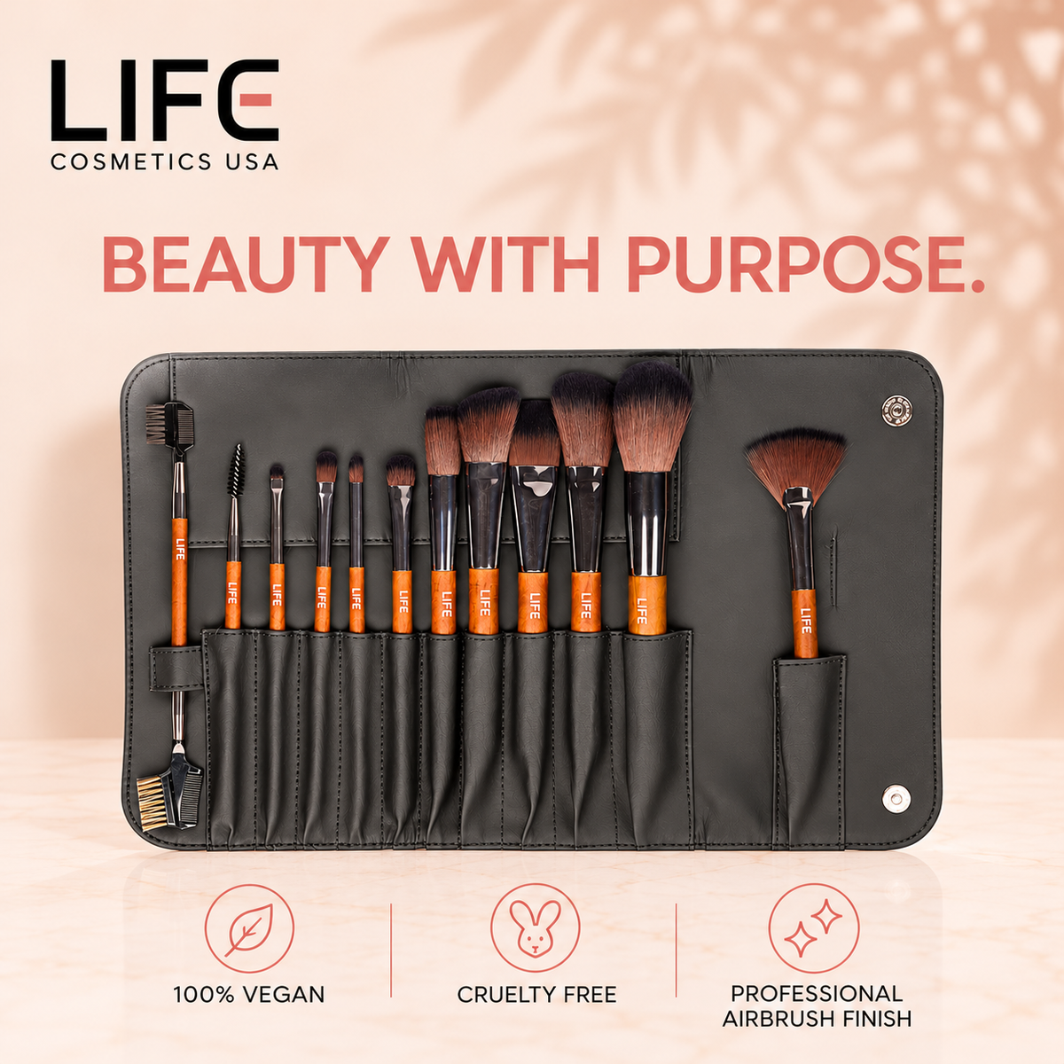 LIFE Cosmetics USA 12-piece brush set in a black pouch with icons labeled vegan, cruelty free and professional airbrush finish.