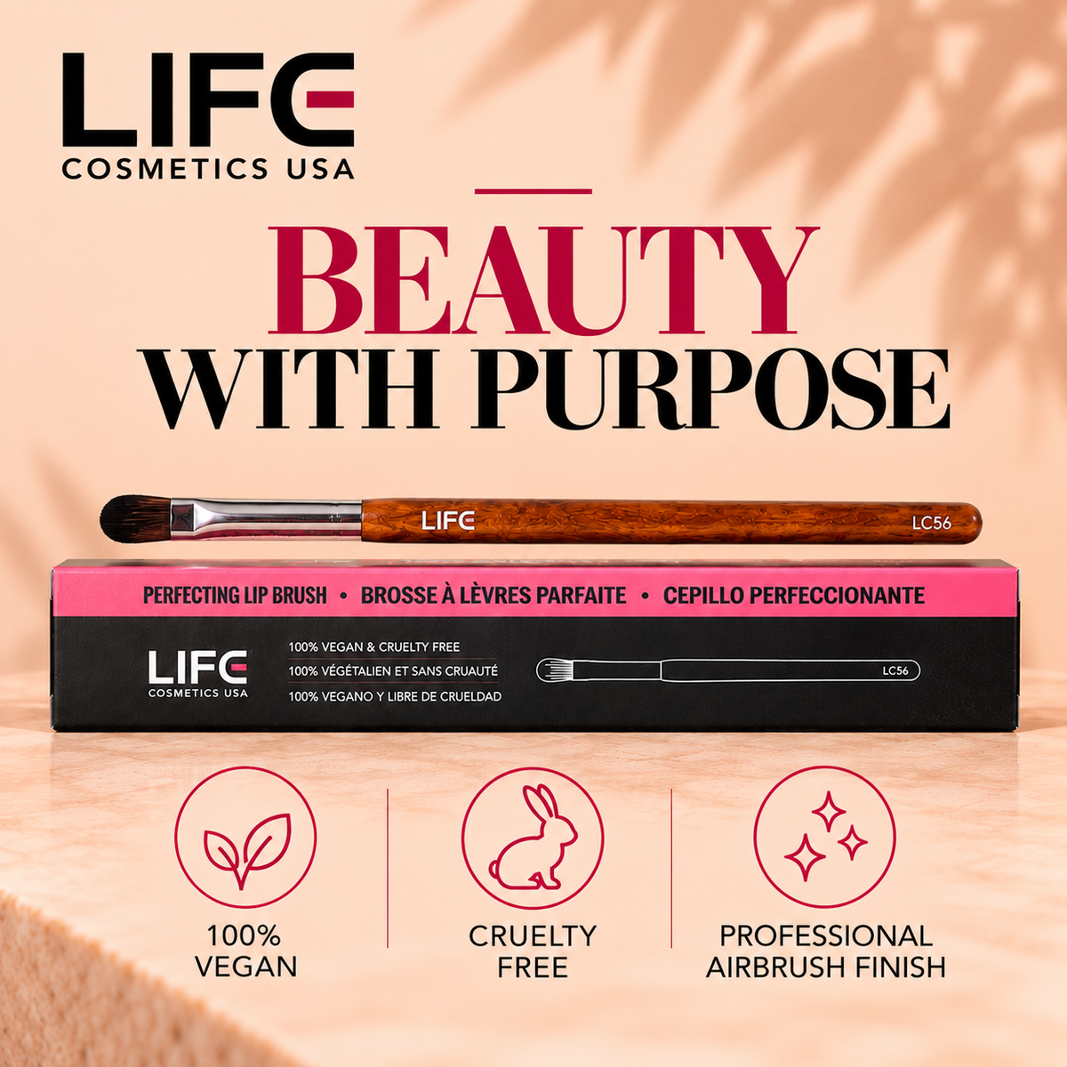 LIFE Cosmetics USA LC56 Perfecting Lip Brush displayed horizontally above its pink-and-black box beneath a Beauty with Purpose headline, with vegan and cruelty-free icons below.
