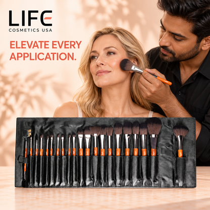 Makeup artist brushing a woman’s cheek behind the LIFE Cosmetics USA 21-piece professional brush set in an open black pouch.