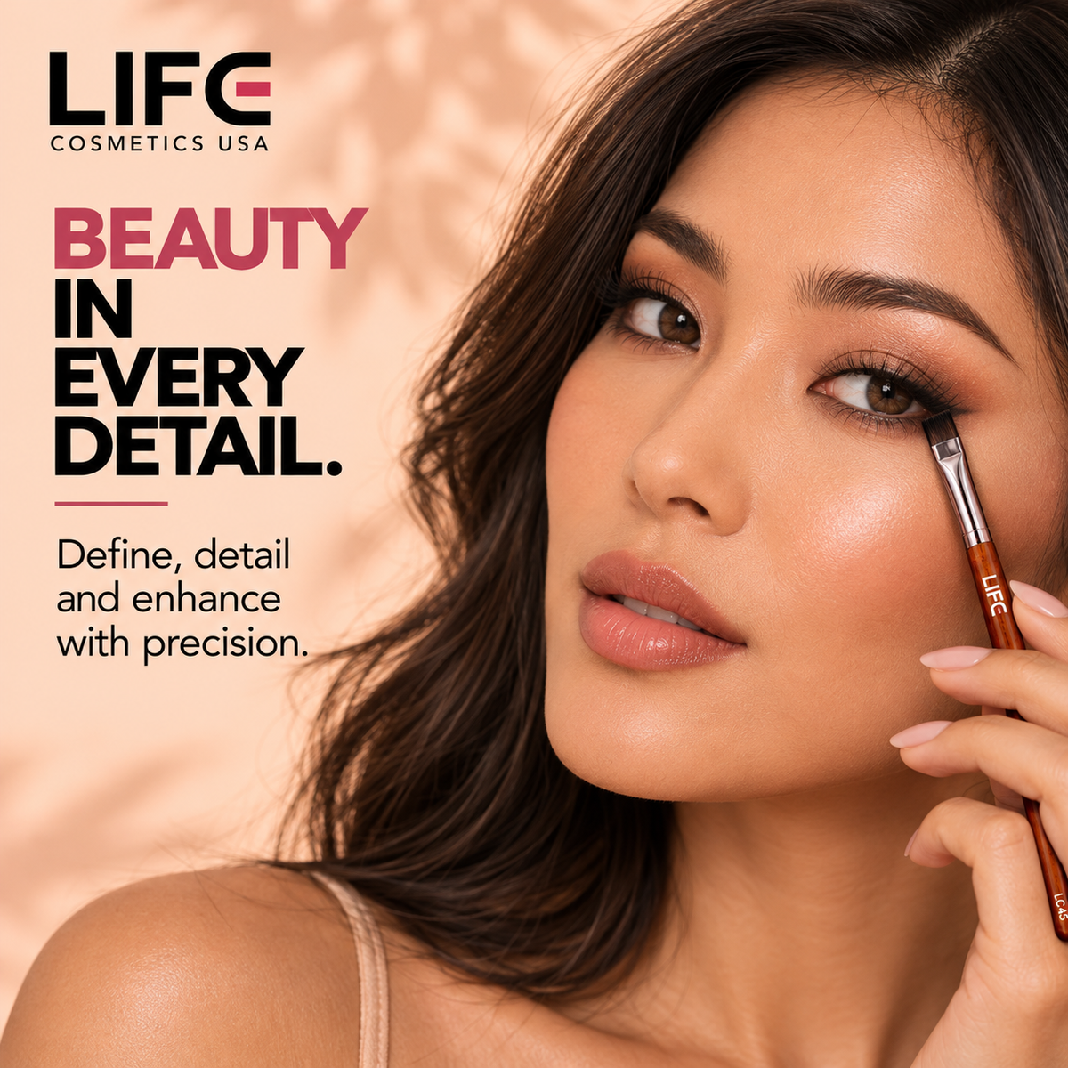 Woman applying eye makeup along her lower lash line with the LIFE Cosmetics USA LC45 Chisel Detailing Brush.