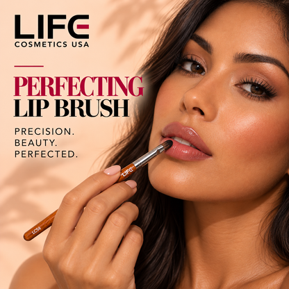 Woman applying glossy pink lip color with the LIFE Cosmetics USA LC56 Perfecting Lip Brush beside the words Precision, Beauty, Perfected.