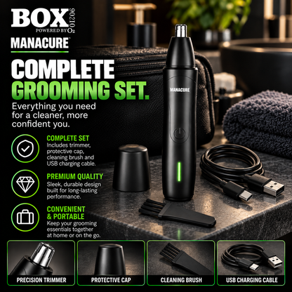 Black MANACURE nose and ear trimmer beside its protective cap, cleaning brush and USB charging cable on a bathroom counter.