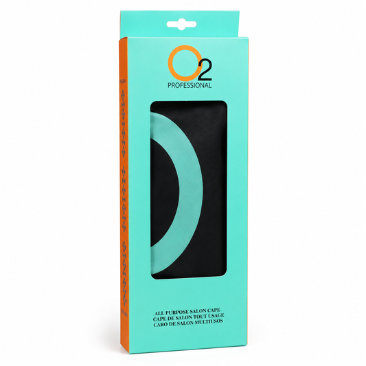 O2 All Purpose Salon Cape in a turquoise box with an orange side panel and a window showing the black cape inside.