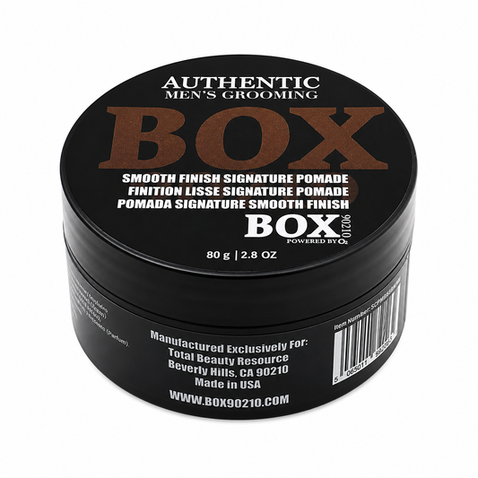Black BOX90210 Smooth Finish Signature Pomade jar with brown and white lettering on its lid, labeled 80 g / 2.8 oz, shown on white.