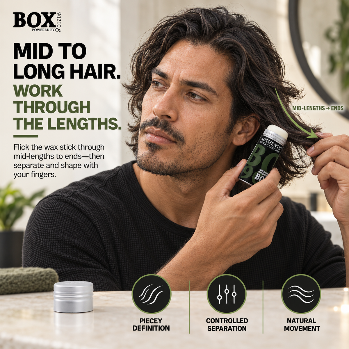 Man applying BOX90210 Morning Hair Wax Stick through the lengths of his wavy hair while holding the ends, with definition, separation and natural-movement callouts.