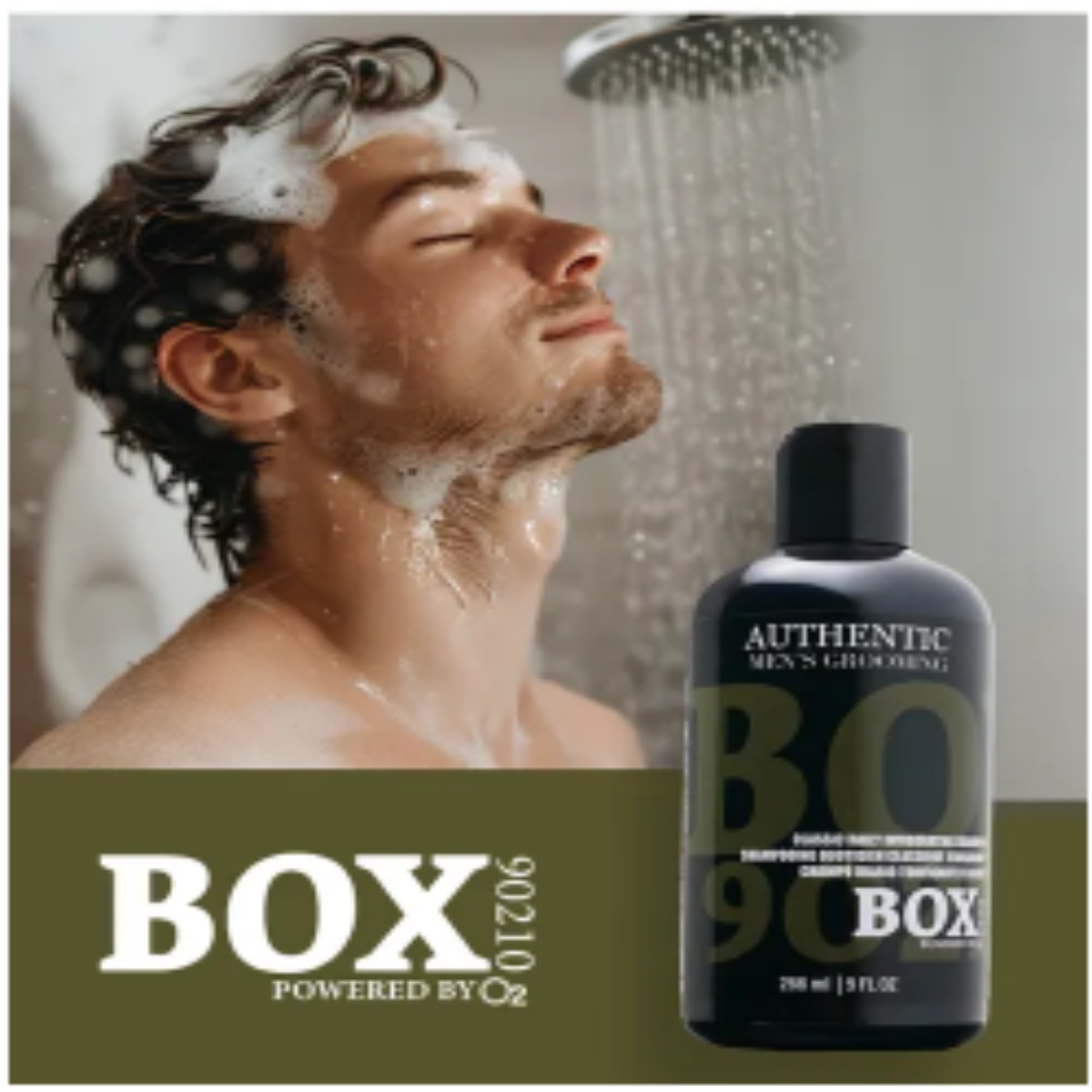 Man showering with a bottle of Box O' Lube men's grooming product.