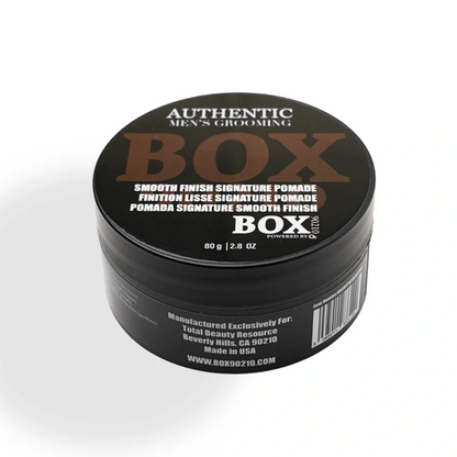 Black container with 'BOX' branding on a white background