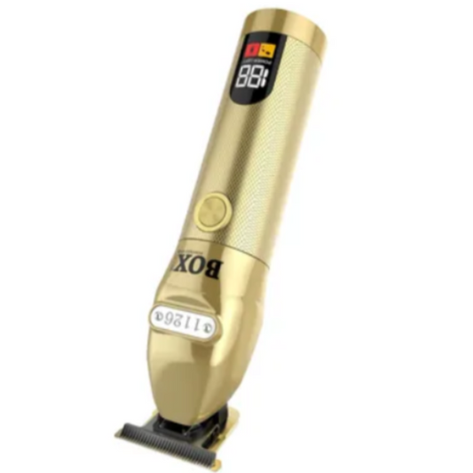 Gold hair clipper on a white background