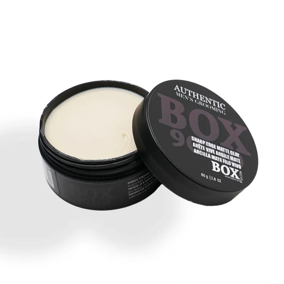 Open jar of cream with 'Box 96' branding on a white background