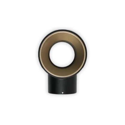 Round metallic object with a black base on a white background