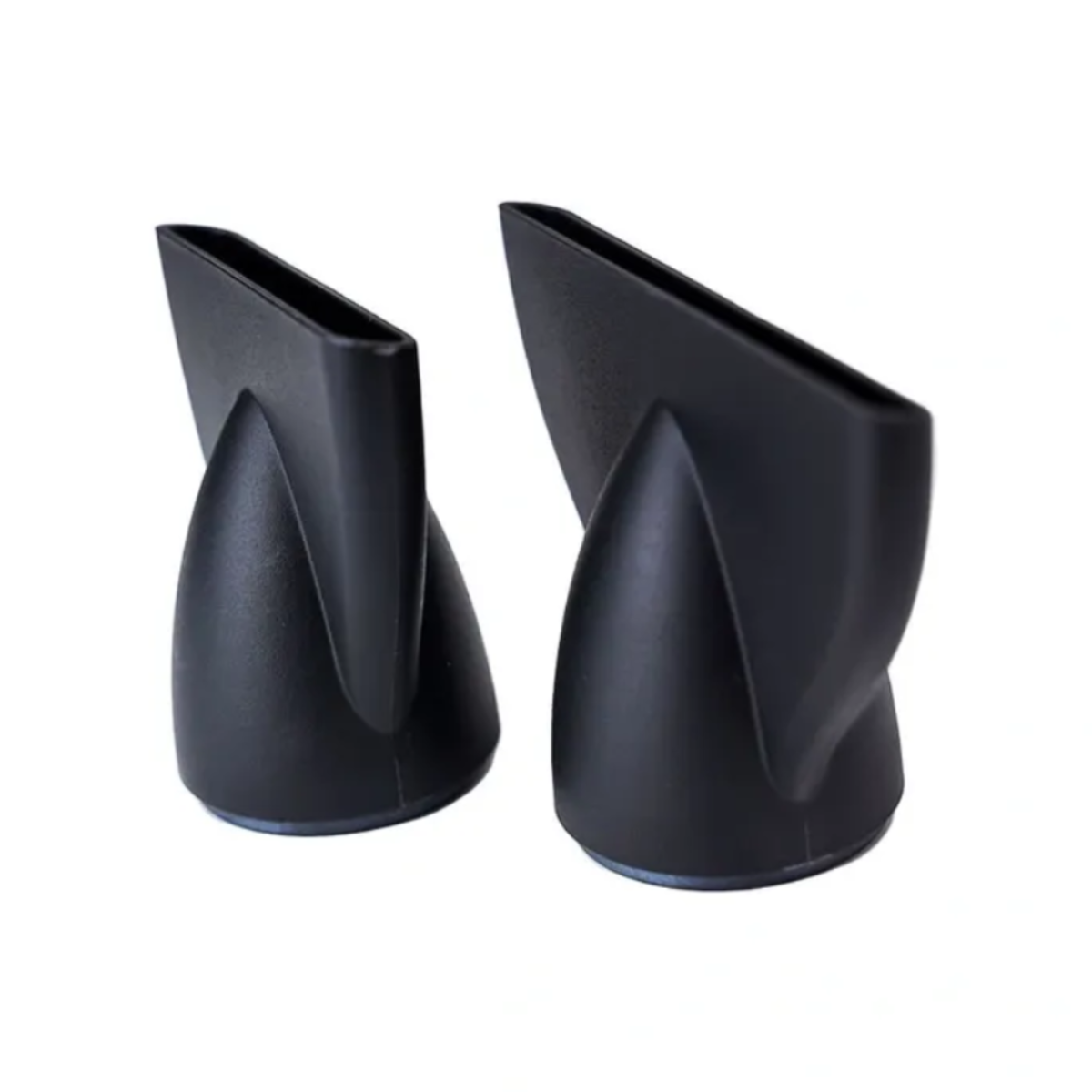 Two black triangular objects on a white background