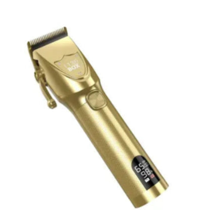 Gold hair clipper on a white background