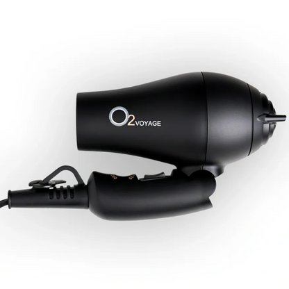 Black hair dryer with 'O2 Voyage' branding on a white background
