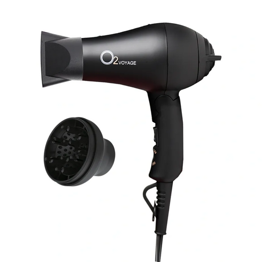 Black hair dryer with detachable nozzle on a white background