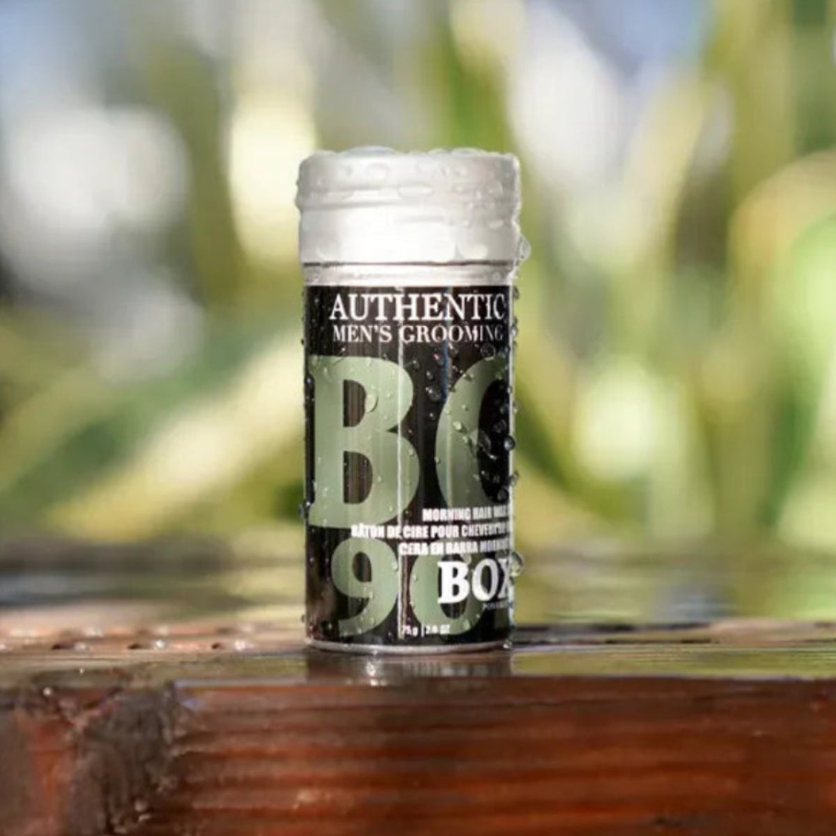 B kompleks supplement bottle on a wooden surface with a blurred natural background