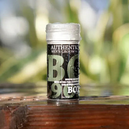 B kompleks supplement bottle on a wooden surface with a blurred natural background