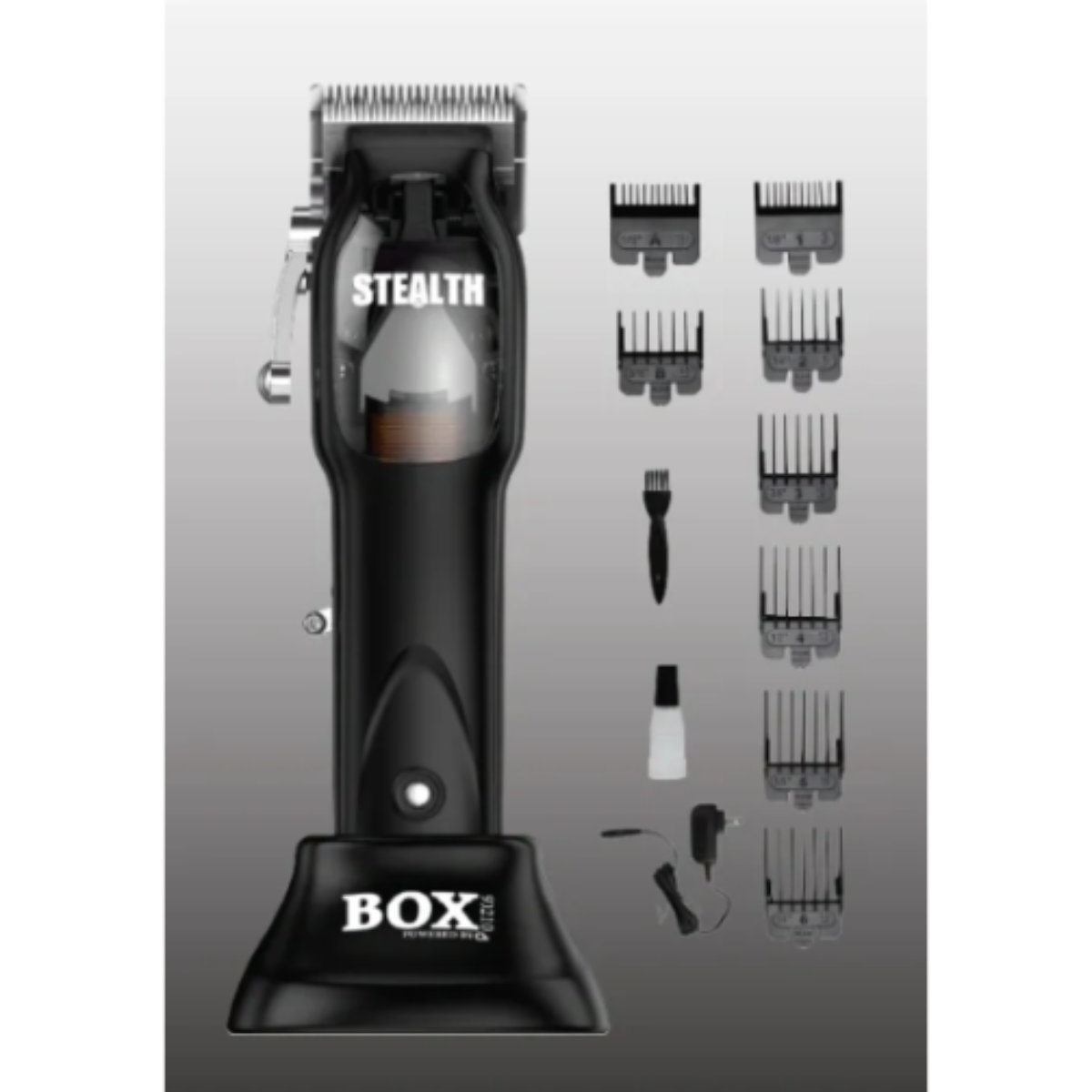 Black hair clipper with attachments on a gray background